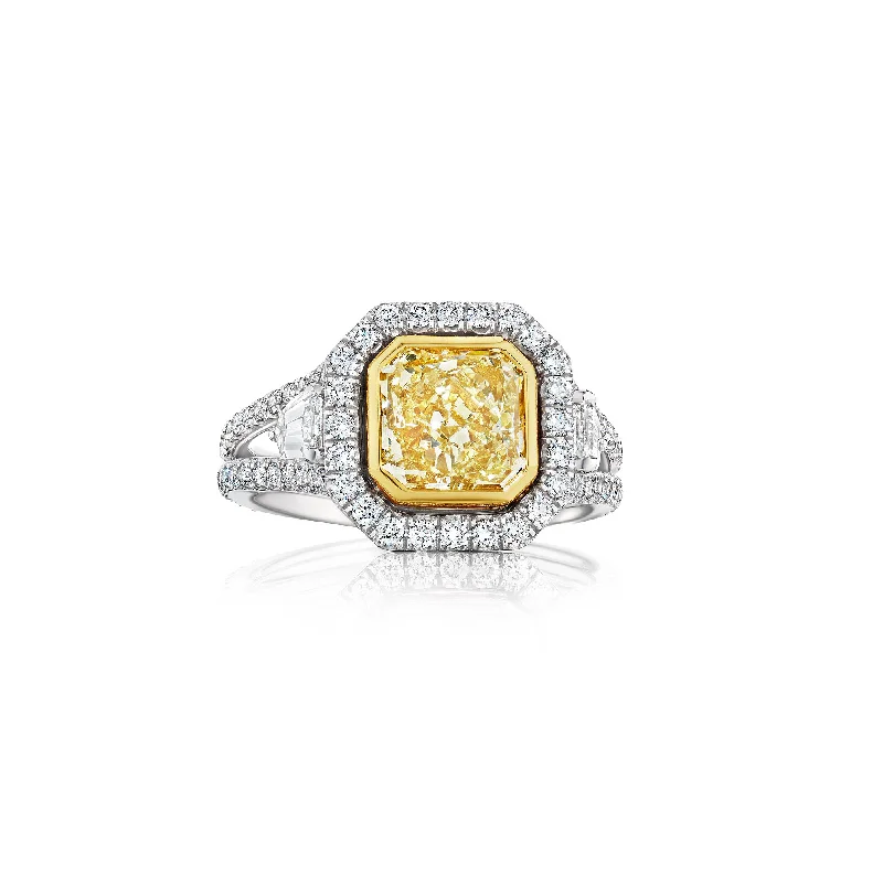 Fink's Exclusive Fancy Light Yellow Radiant Cut Diamond Engagement Ring with Diamond Halo