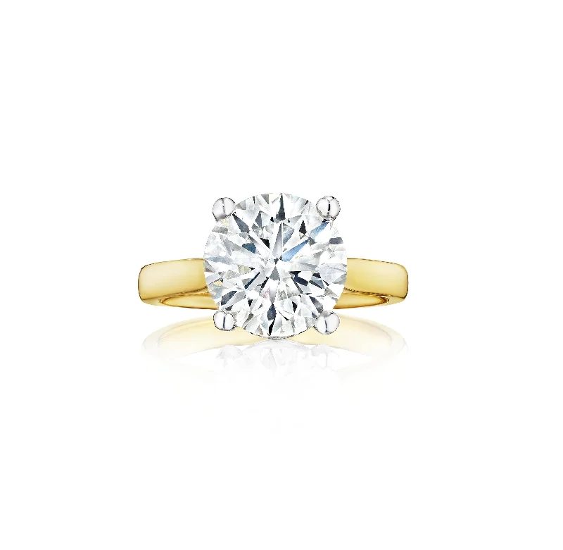 Fink's Exclusive Round Diamond Solitaire Ring in Platinum and Yellow Gold