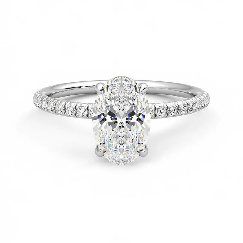 Four-Prong Oval Cut Moissanite Engagement Ring with Hidden Anniversary Stone Accent