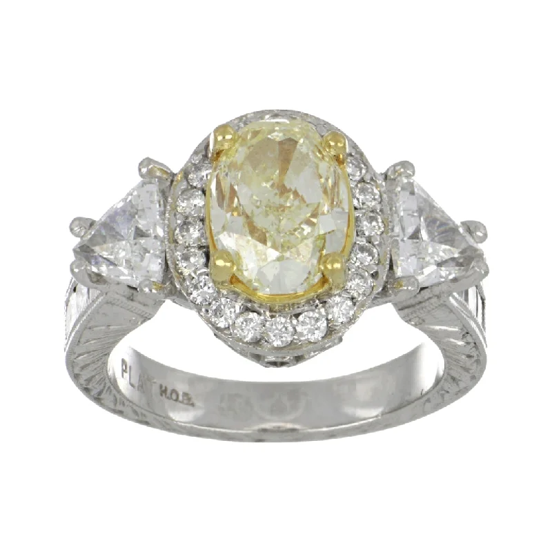 Yellow Diamond Ring (Yellow Diamond 2.69 cts. White Diamond 1.26 cts. White Diamond 0.72 cts.)